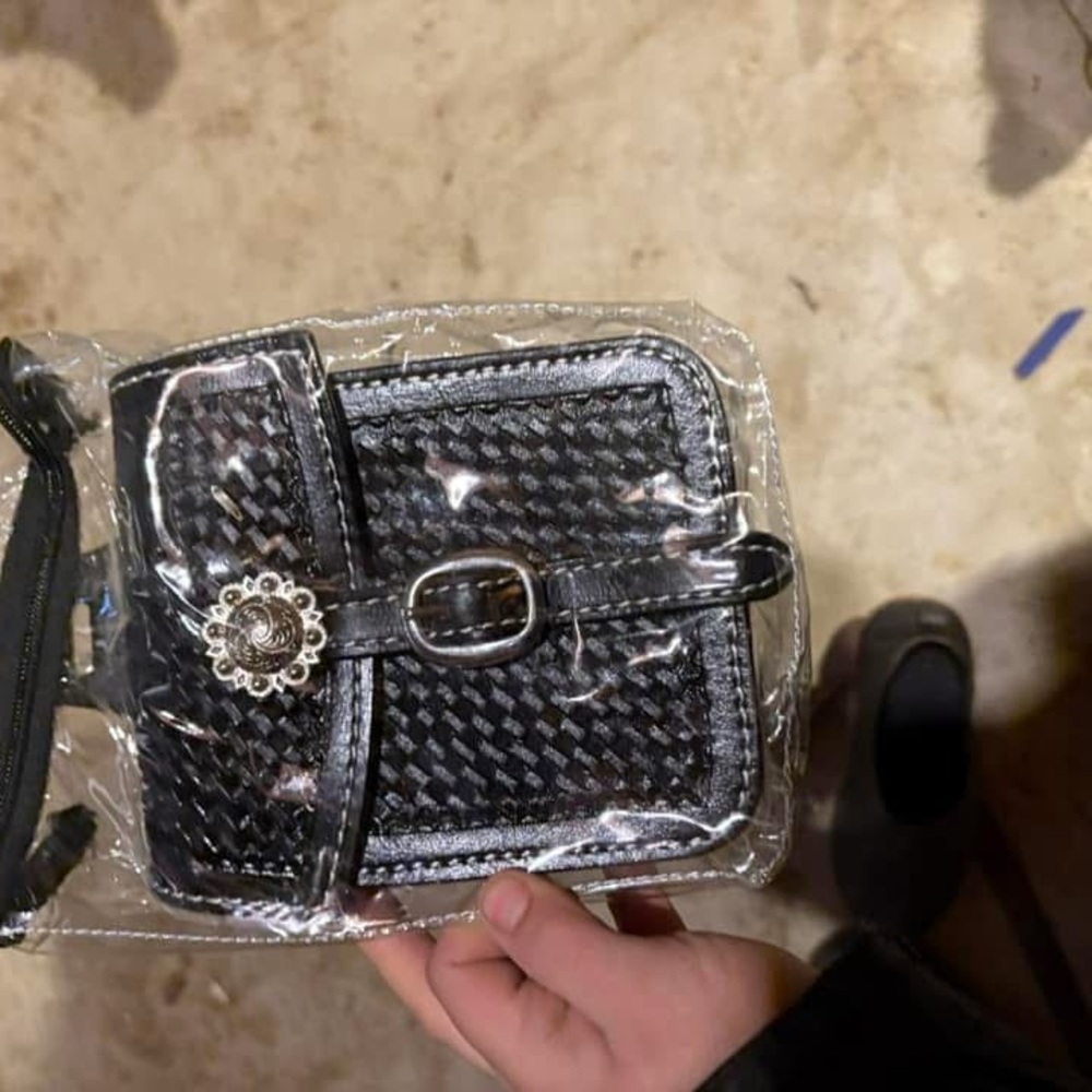 Chic Black Mini Bag with Woven Material and Metallic Accents